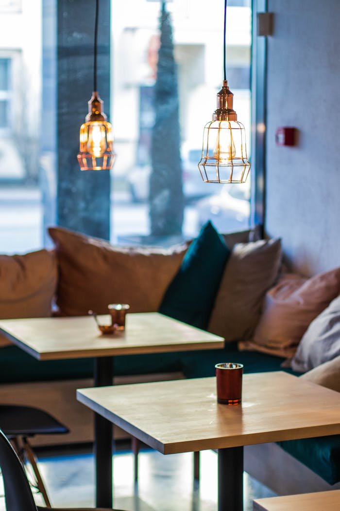 Two Round Pendant Lamps in Cafeteria